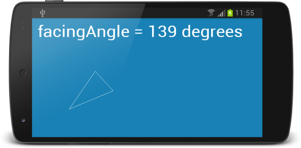 The rotation demo showing a white triangle ship on a blue background with the facing angle displayed.