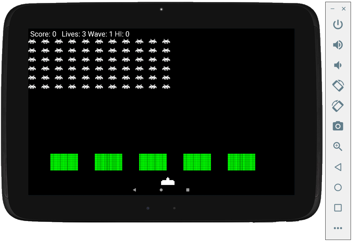 Space Invaders game showing the shelters being damaged by invader fire.