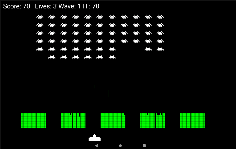 The finished Kotlin Space Invaders game running on Android, showing the invader formation, player ship, shelters, and score display.