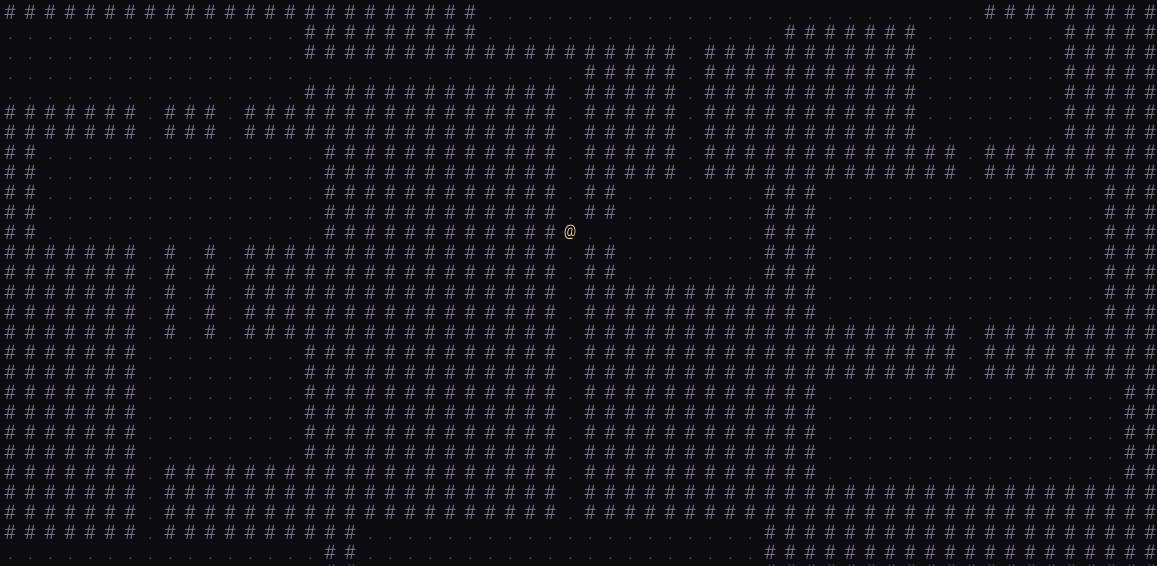 The @ player character in a corridor between rooms, having moved away from the starting position