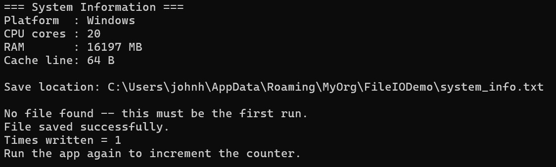 File I/O and System demo output showing platform info and file save confirmation in the console.